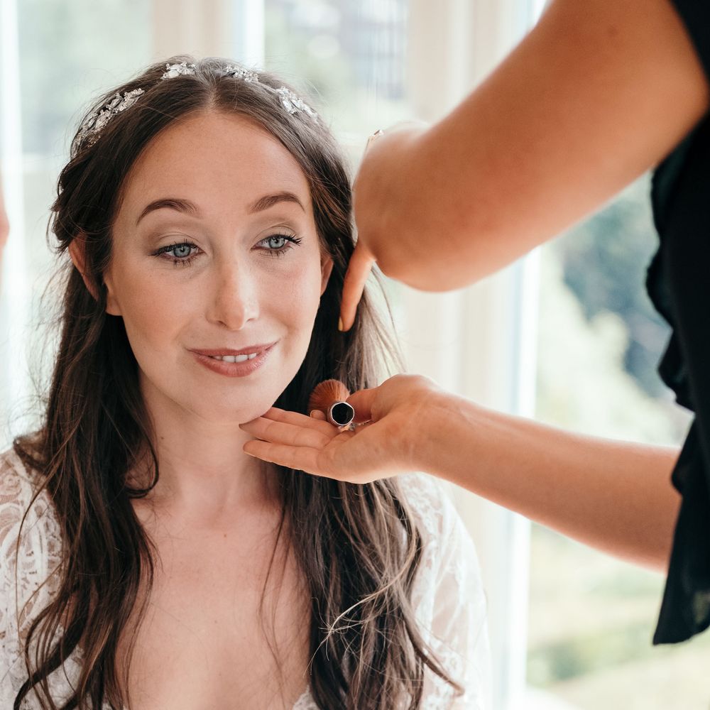Marquee in Jersey. Foliage Installations. Stationery by Quints of Jersey. Bride Wears Enzoani. Photography by Max Burnett
