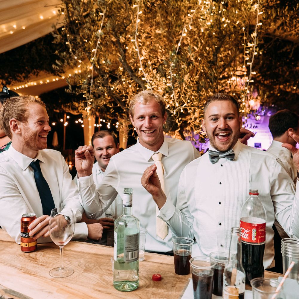 Marquee in Jersey. Foliage Installations. Stationery by Quints of Jersey. Bride Wears Enzoani. Photography by Max Burnett
