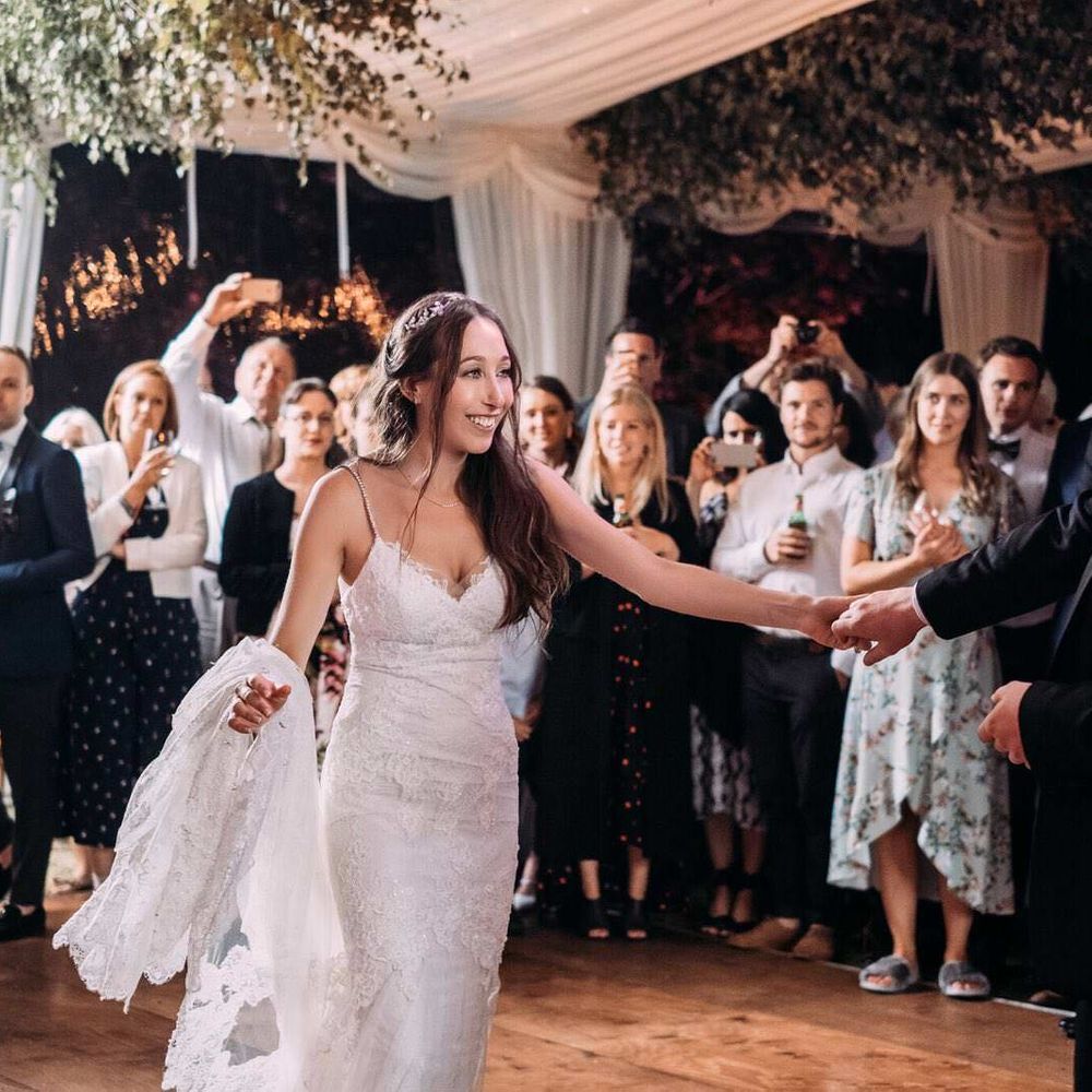 Marquee in Jersey. Foliage Installations. Stationery by Quints of Jersey. Bride Wears Enzoani. Photography by Max Burnett