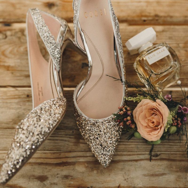 Silver glitter wedding shoes and perfume