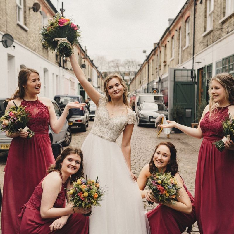 Former 2014 Great British Bake Off contestant Martha Collinson with her bridesmaids