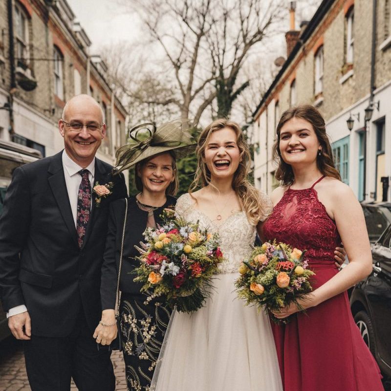 Bride portrait with her family