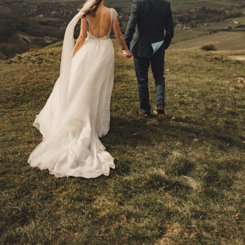 former 2014 Great British Bake Off contestant Martha Collinson in low back Moriilee wedding dress