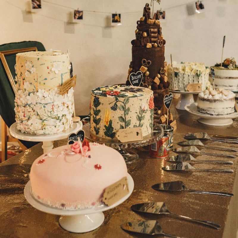 Dessert table at the rustic barn wedding on former 2014 Great British Bake Off contestant Martha Collinson