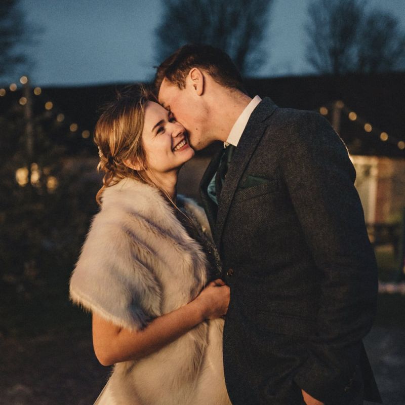 former 2014 Great British Bake Off contestant Martha Collinson in faux fur coverup at her wedding