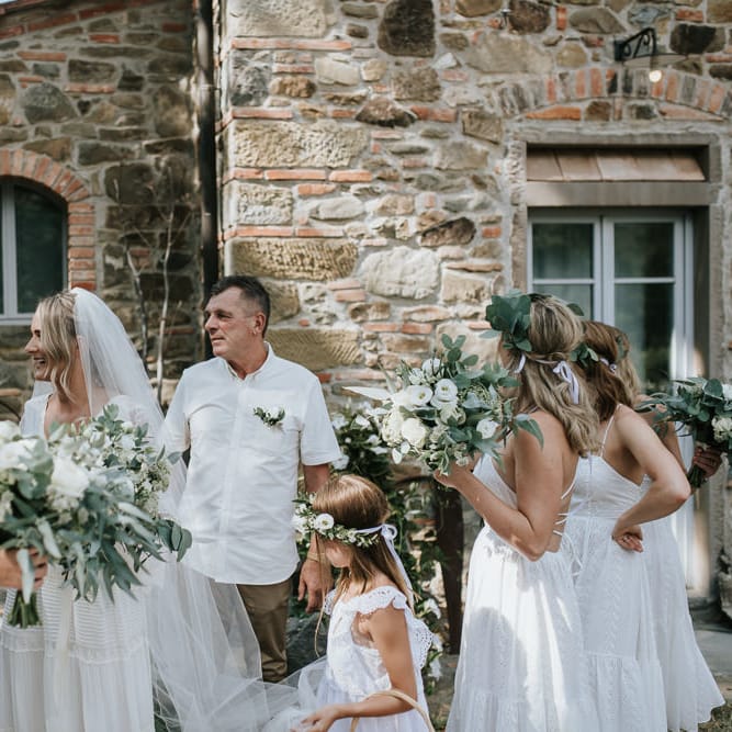 Bridal Party | Bridesmaids in White Dresses | Bride in Spell &amp; The Gypsy  Collective Bell Sleeve Boho Wedding Dress |  | Outdoor Bohemian Destination Wedding at La Selva, Tuscany | Damien Milan Photography