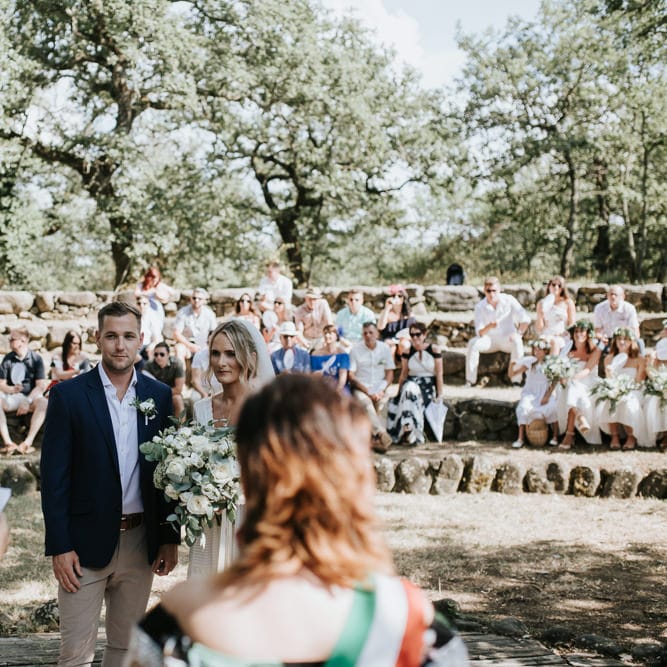 Outdoor Wedding Ceremony | Bride in Spell &amp; the Gypsy Collective Bell Sleeve Wedding Dress | Groom in Chino's &amp; Blazer | Outdoor Bohemian Destination Wedding at La Selva, Tuscany | Damien Milan Photography