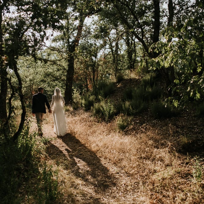 Bride in Spell &amp; the Gypsy Collective Bell Sleeve Wedding Dress | Groom in Chino's &amp; Blazer | Outdoor Bohemian Destination Wedding at La Selva, Tuscany | Damien Milan Photography