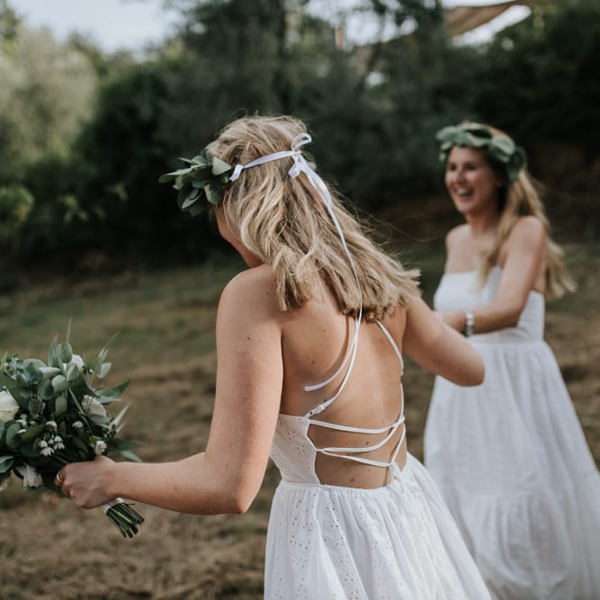 Bridesmaids in White Tie Back Dresses | Outdoor Bohemian Destination Wedding at La Selva, Tuscany | Damien Milan Photography