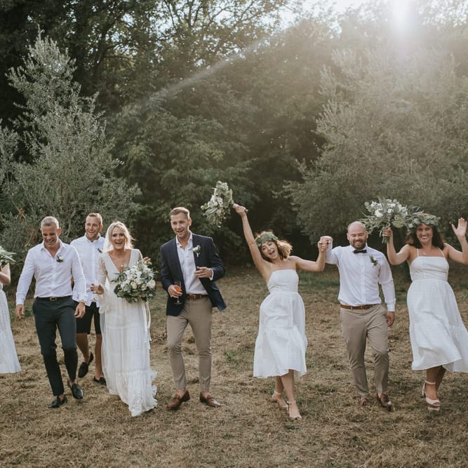 Wedding Party | Bride in Spell &amp; the Gypsy Collective Bell Sleeve Wedding Dress | Bridesmaids in White Dresses | Groom in Chino's &amp; Blazer | Outdoor Bohemian Destination Wedding at La Selva, Tuscany | Damien Milan Photography