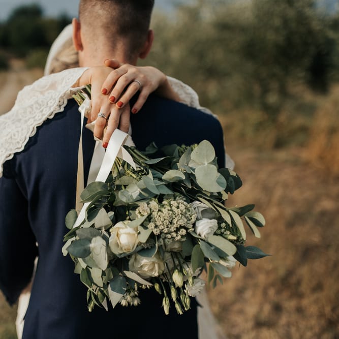 White &amp; Green Bouquet | Bride in Spell &amp; the Gypsy Collective Bell Sleeve Wedding Dress | Groom in Chino's &amp; Blazer | Outdoor Bohemian Destination Wedding at La Selva, Tuscany | Damien Milan Photography