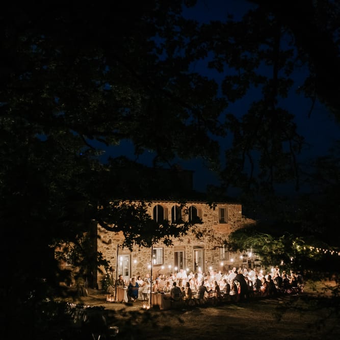 Festoon Lit Outdoor Reception | Bohemian Destination Wedding at La Selva, Tuscany | Damien Milan Photography