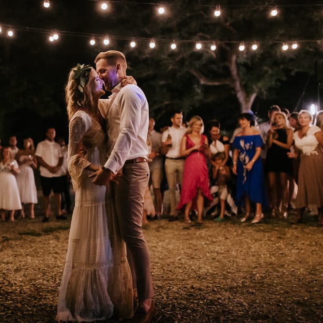 First Dance | Bride in Spell &amp; the Gypsy Collective Bell Sleeve Wedding Dress | Groom in Chino's &amp; Blazer | Outdoor Bohemian Destination Wedding at La Selva, Tuscany | Damien Milan Photography