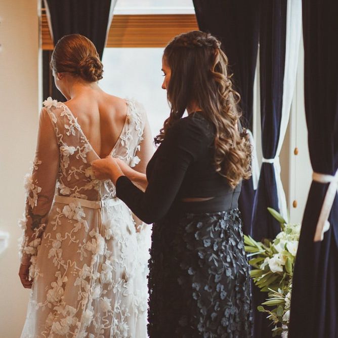 Bride gets ready in her Marchesa bridal gown
