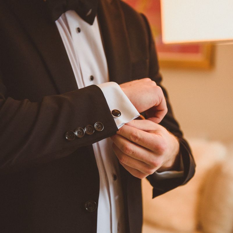Groom preparations for New York wedding