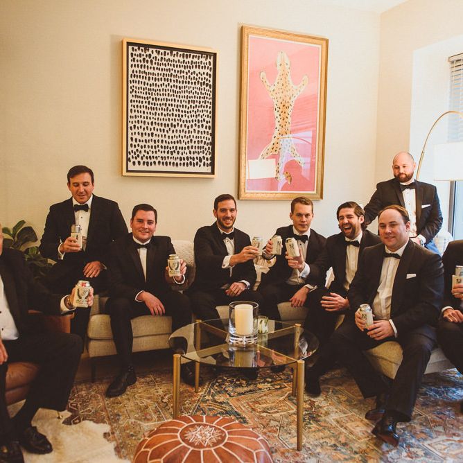Groomsmen in matching tuxedos for Winter wedding