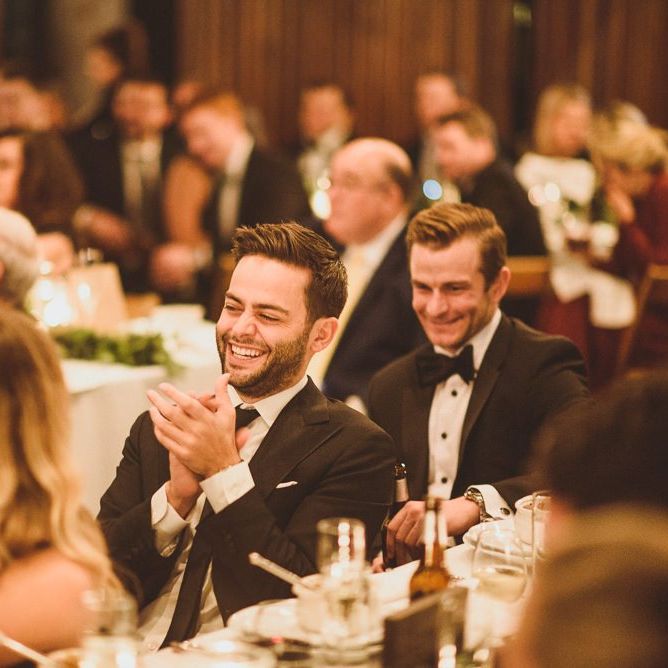 Guests enjoy the wedding speeches