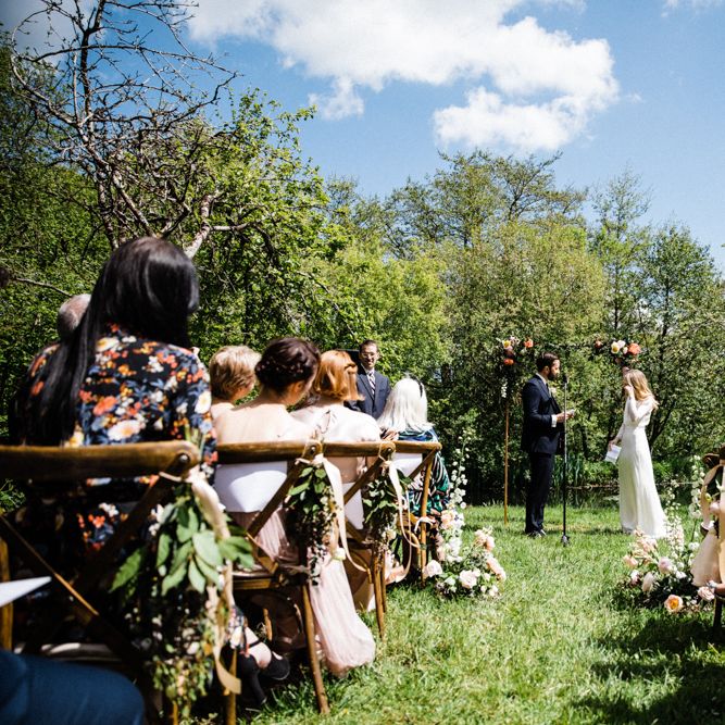 Bride and Groom Exchanging Vows at Outdoor Anran Wedding Ceremony