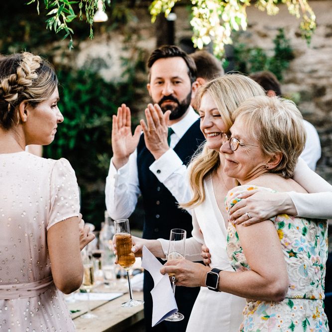 Bride Embracing Her mum during the wedding speeches