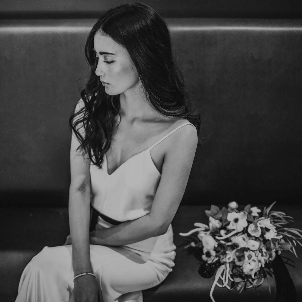 Bride in Slinky Marquis Bridal Gown | Minimalist Monochrome Inspiration with Anemone's &amp; White Genista Flowers styled by The Bijou Bride | Igor Demba Photography | Gione da Silva  Film