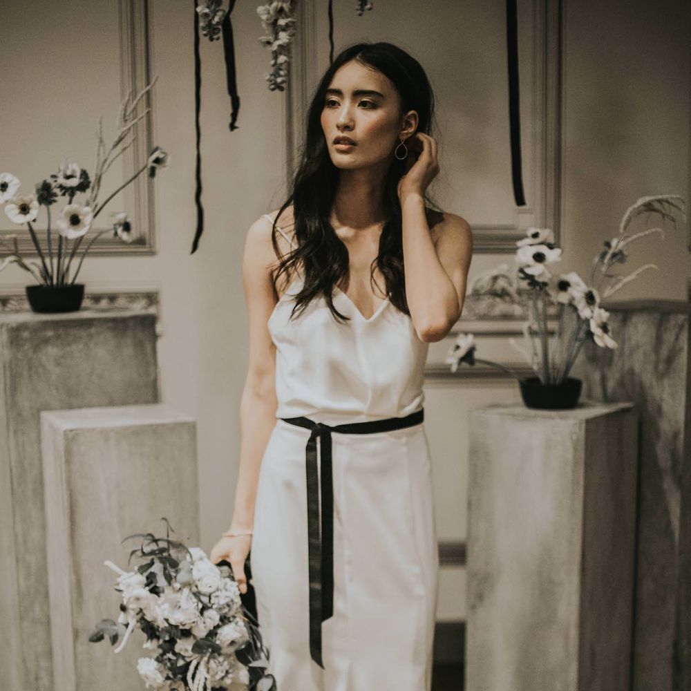 Bride in Slinky Marquis Bridal Gown | Anemone &amp; Ranunculus Bridal Bouquet | Minimalist Monochrome Inspiration with Anemone's &amp; White Genista Flowers styled by The Bijou Bride | Igor Demba Photography | Gione da Silva  Film