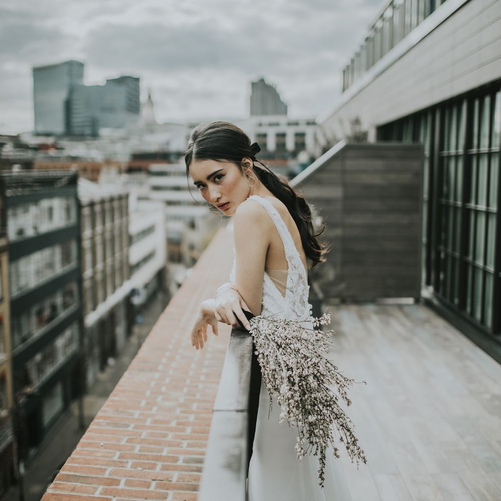 Bride in Fitted Marquis Bridal Gown with White Genista Bouquet | Minimalist Monochrome Inspiration with Anemone's &amp; White Genista Flowers styled by The Bijou Bride | Igor Demba Photography | Gione da Silva  Film