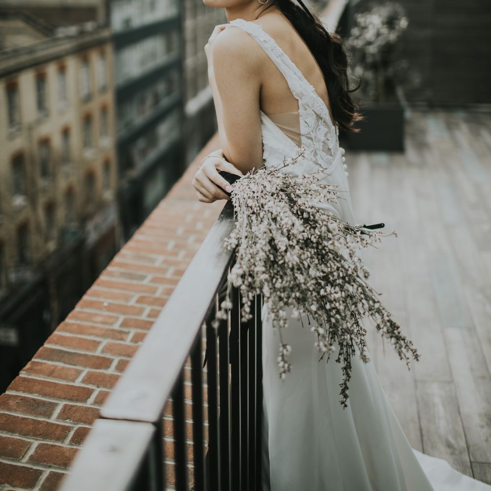 Bride in Fitted Marquis Bridal Gown with White Genista Bouquet | Minimalist Monochrome Inspiration with Anemone's &amp; White Genista Flowers styled by The Bijou Bride | Igor Demba Photography | Gione da Silva  Film