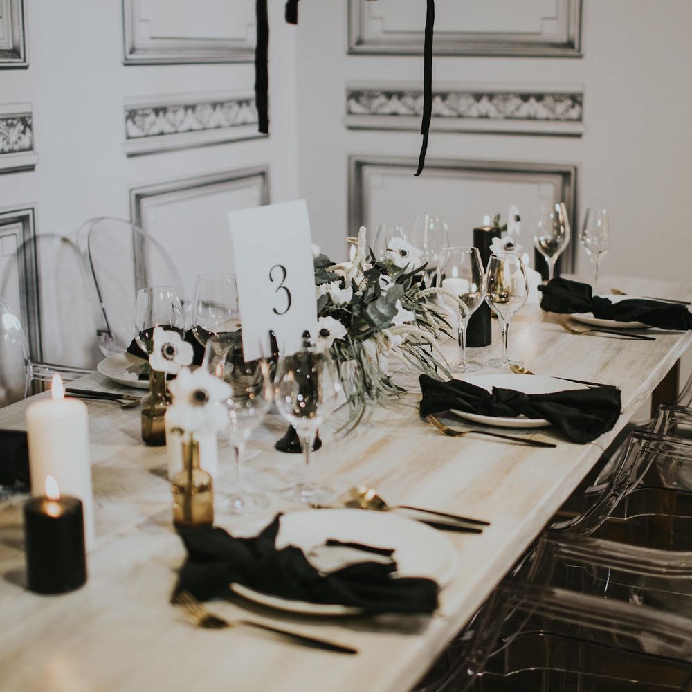 Elegant Tablescape with Ghost Chairs &amp; Hanging Anemone Floral Arrangement | Minimalist Monochrome Inspiration with Anemone's &amp; White Genista Flowers styled by The Bijou Bride | Igor Demba Photography | Gione da Silva  Film