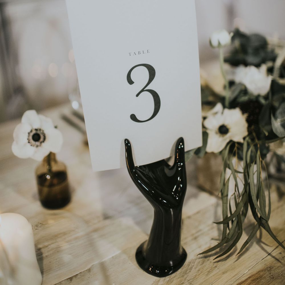 Nat's Paper Studio Table Number Stationery | Elegant Tablescape with Ghost Chairs &amp; Hanging Anemone Floral Arrangement | Minimalist Monochrome Inspiration with Anemone's &amp; White Genista Flowers styled by The Bijou Bride | Igor Demba Photography | Gione da Silva  Film
