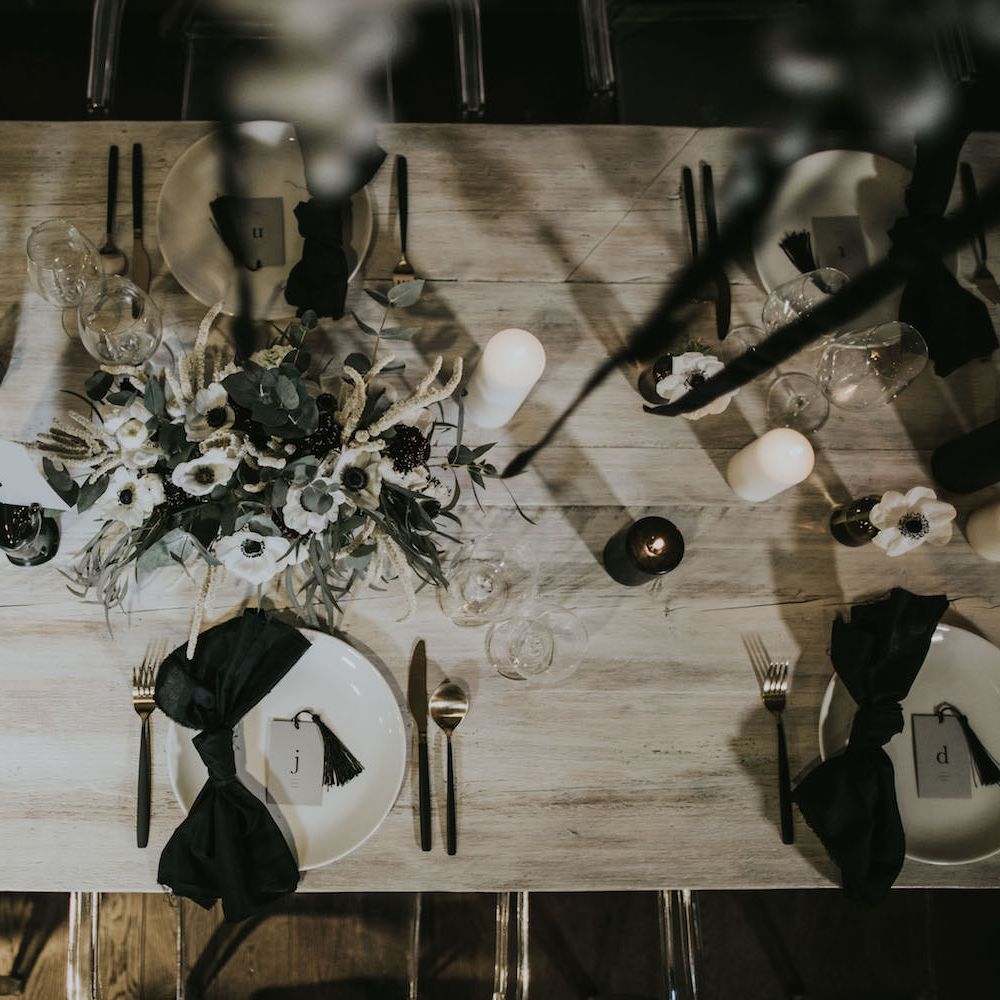 Elegant Tablescape with Ghost Chairs &amp; Hanging Anemone Floral Arrangement | Minimalist Monochrome Inspiration with Anemone's &amp; White Genista Flowers styled by The Bijou Bride | Igor Demba Photography | Gione da Silva  Film