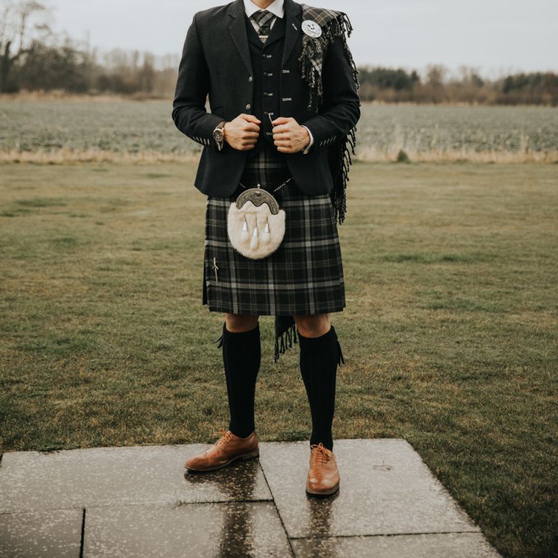 Groom in traditional kilt for Kinkell Byre wedding