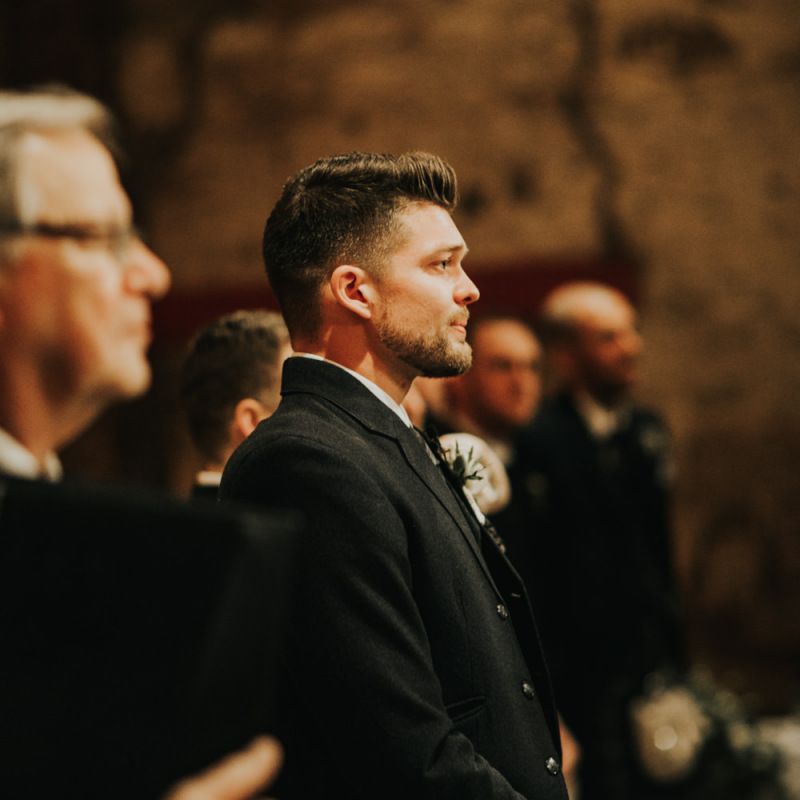 Groom waits for bride to arrive at wedding cermony
