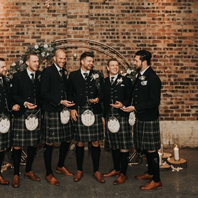 Groomsmen in traditional Scottish kilts