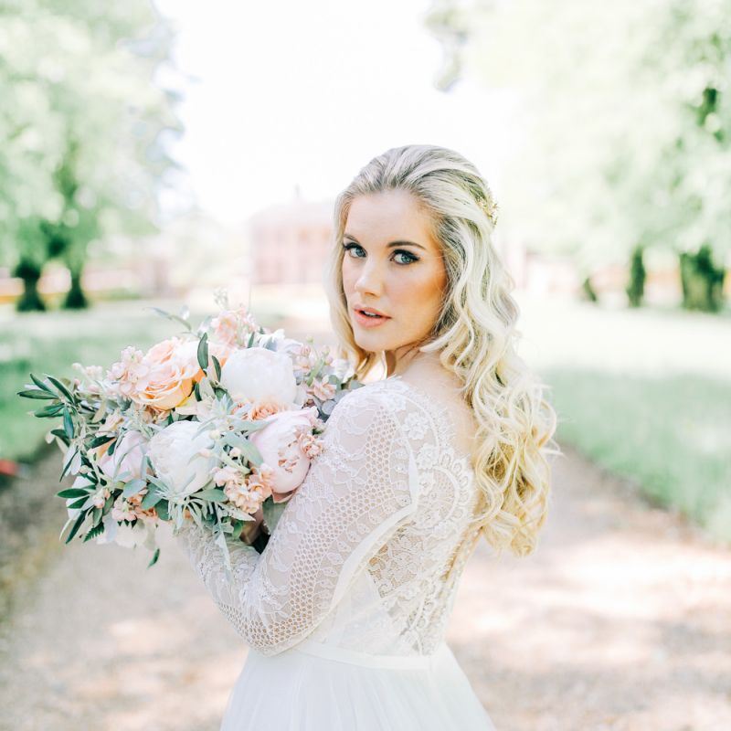 Bride in Lace Wedding Dress Holding White Peony and Peach David Austin Rose Wedding Bouquet
