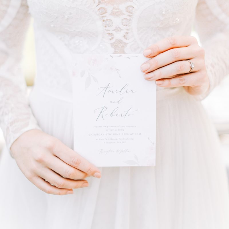 Bride Holding Elegant Wedding Invitation