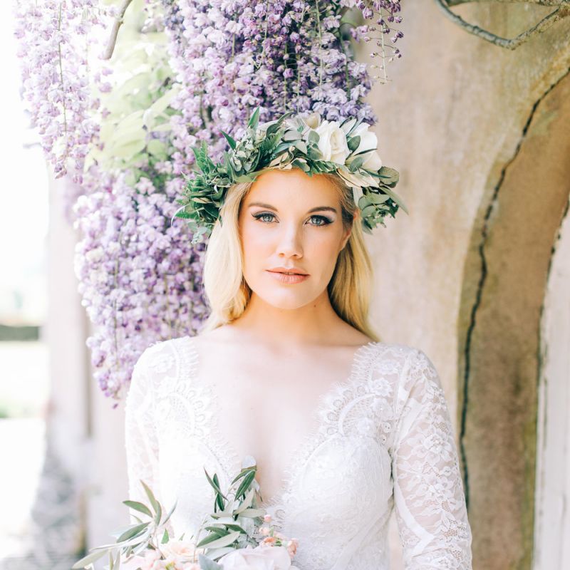 Bride in Flower Crown Holding Peach and White Wedding Bouquet