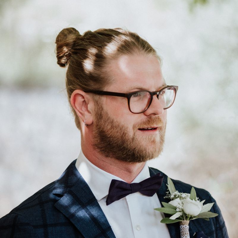 Groom in Blue Check Suit, Bow Tie and Top Knot
