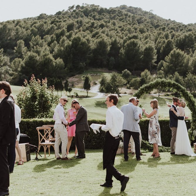 Wedding Guests Enjoying the Outdoor Reception