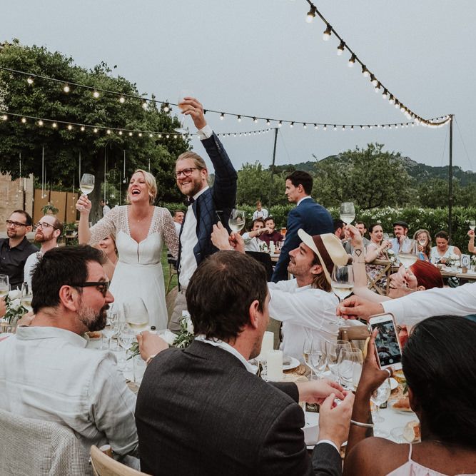 Bride and Groom Toasting During Their Wedding Reception