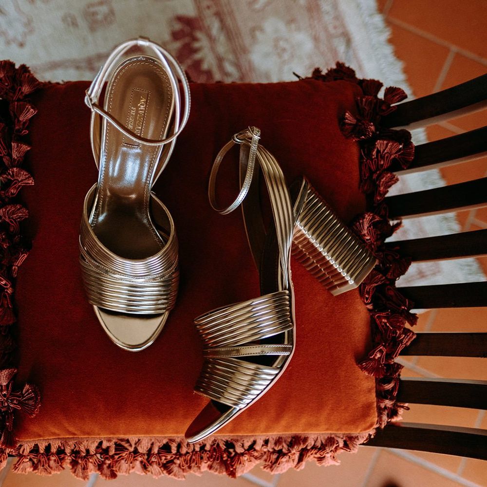 Gold wedding shoes for bride in 3D flower wedding dress