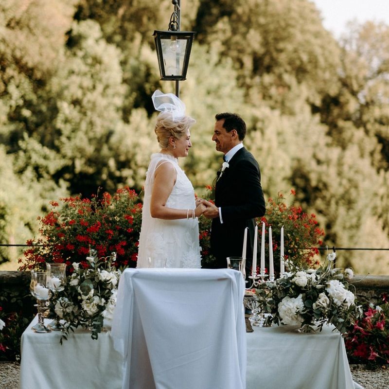 Bride in 3D flower wedding dress with groom at Florence wedding