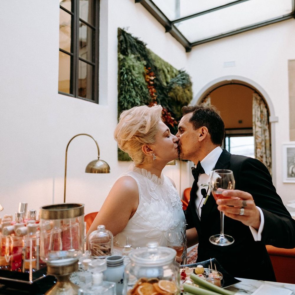 Bride and groom enjoy a drink after ceremony