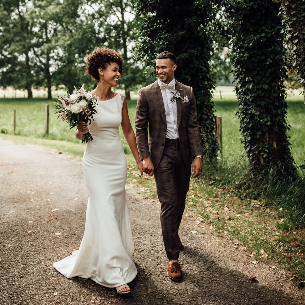 Caribbean Influenced Wedding Kingsthorpe Lodge Barn With Steel Band And Bride In Maggie Sottero Images From Ania Ames Photography
