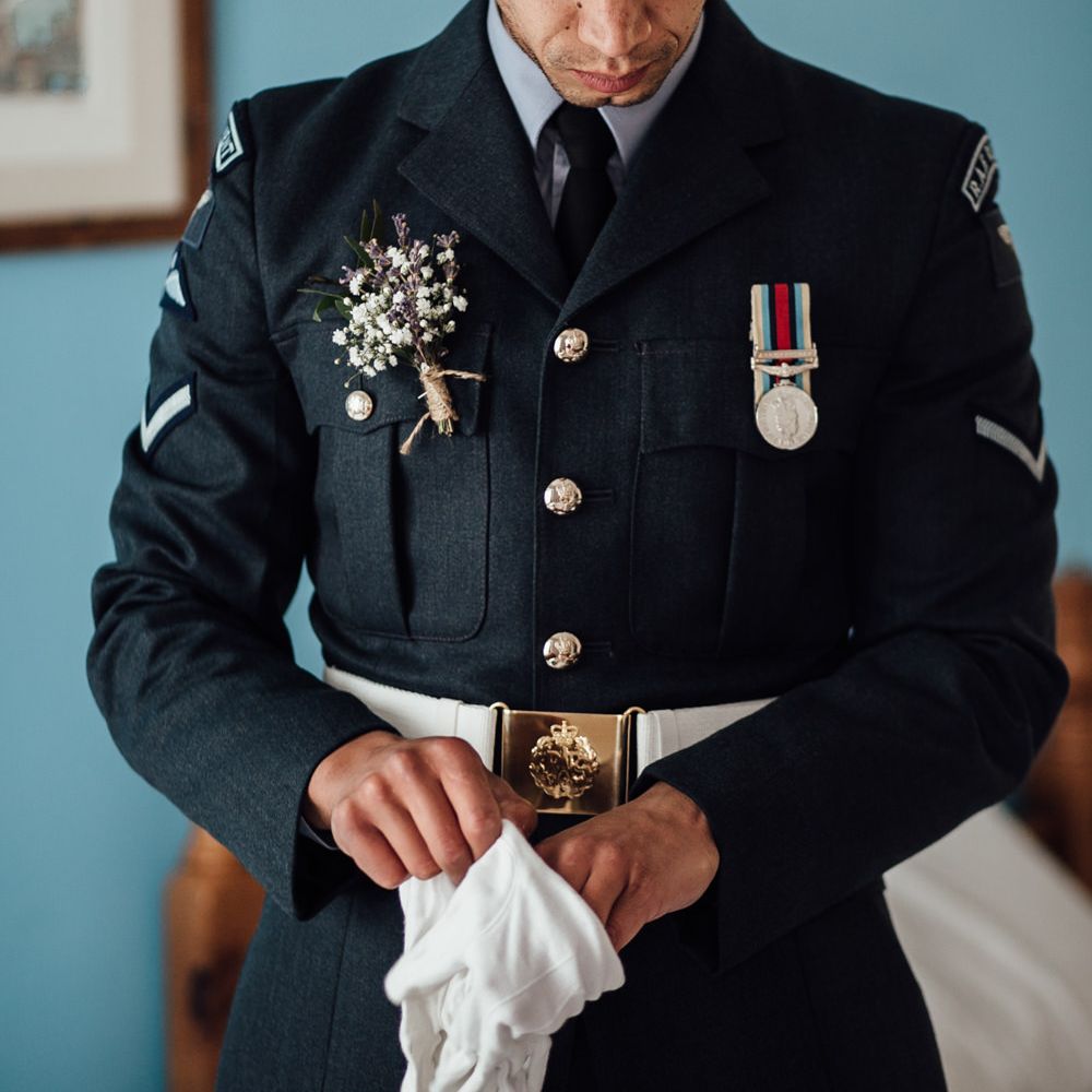 Groom In Military Uniform // Caribbean Influenced Wedding Kingsthorpe Lodge Barn With Steel Band And Bride In Maggie Sottero Images From Ania Ames Photography