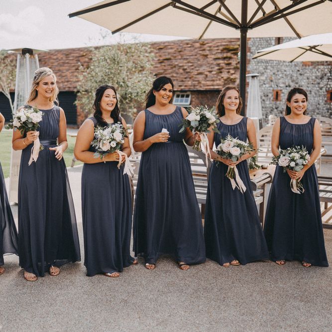 Grey bridesmaid dresses at Farbridge wedding venue