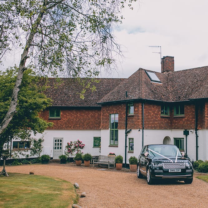 Tor Hatch House | Range Rover Wedding Car | Halterneck Maggie Sottero Dress and Garden Games at Gate Street Barn | Story + Colour Photography
