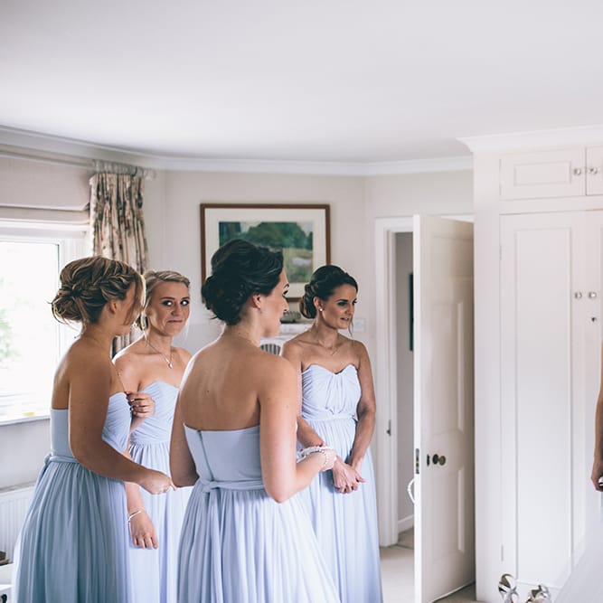 Wedding Morning Preparations | Beaded Halterneck Bridal Gown with Tulle Skirt and Spaghetti Straps by Maggie Sottero | Pastel Blue Bridesmaids Dresses from ASOS | Halterneck Maggie Sottero Dress and Garden Games at Gate Street Barn | Story + Colour Photography