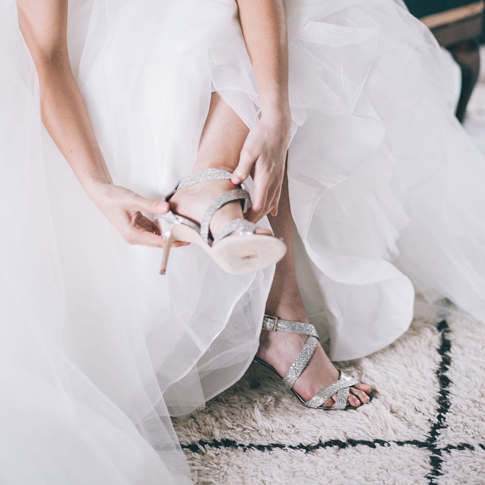 Wedding Morning Preparations | Beaded Halterneck Bridal Gown with Tulle Skirt and Spaghetti Straps by Maggie Sottero | Sparkly Silver Jimmy Choo Shoes | Halterneck Maggie Sottero Dress and Garden Games at Gate Street Barn | Story + Colour Photography