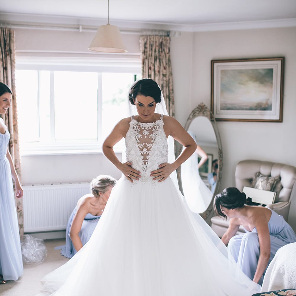 Wedding Morning Preparations | Beaded Halterneck Bridal Gown with Tulle Skirt and Spaghetti Straps by Maggie Sottero | Pastel Blue Bridesmaids Dresses from ASOS | Halterneck Maggie Sottero Dress and Garden Games at Gate Street Barn | Story + Colour Photography