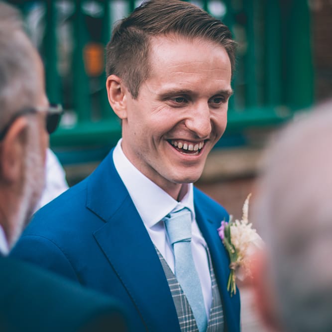 Groom in Royal Blue Suit with Pastel Blue Tie from Suit Supply | Halterneck Maggie Sottero Dress and Garden Games at Gate Street Barn | Story + Colour Photography